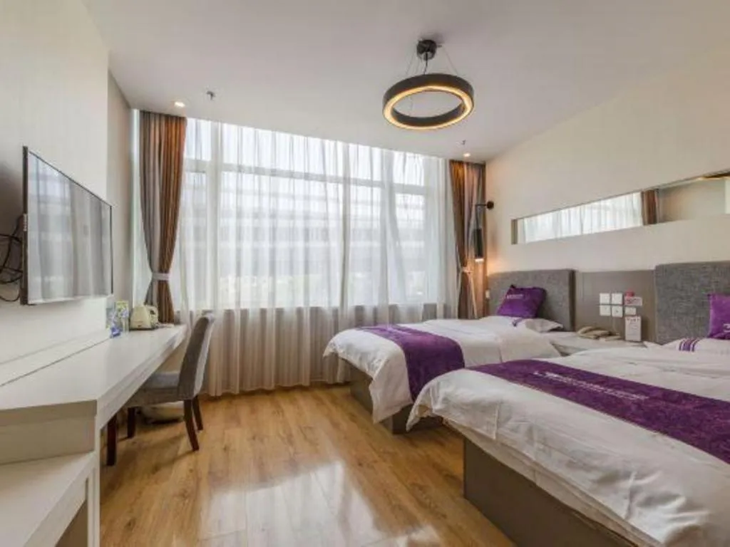 Bed in City 118 Hotel Qingdao Boardcast Tower