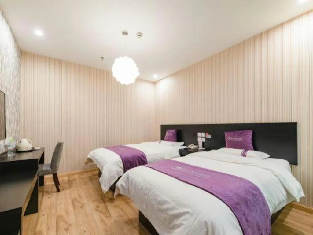 Bed in City 118 Hotel Qingdao Boardcast Tower