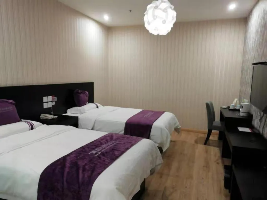 Bed in City 118 Hotel Qingdao Boardcast Tower