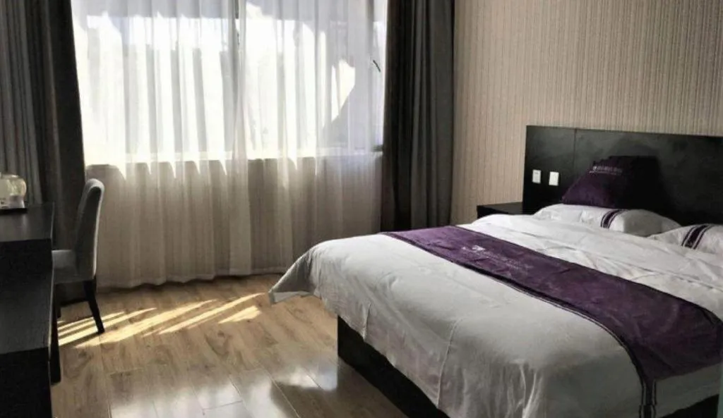 Bed in City 118 Hotel Qingdao Boardcast Tower