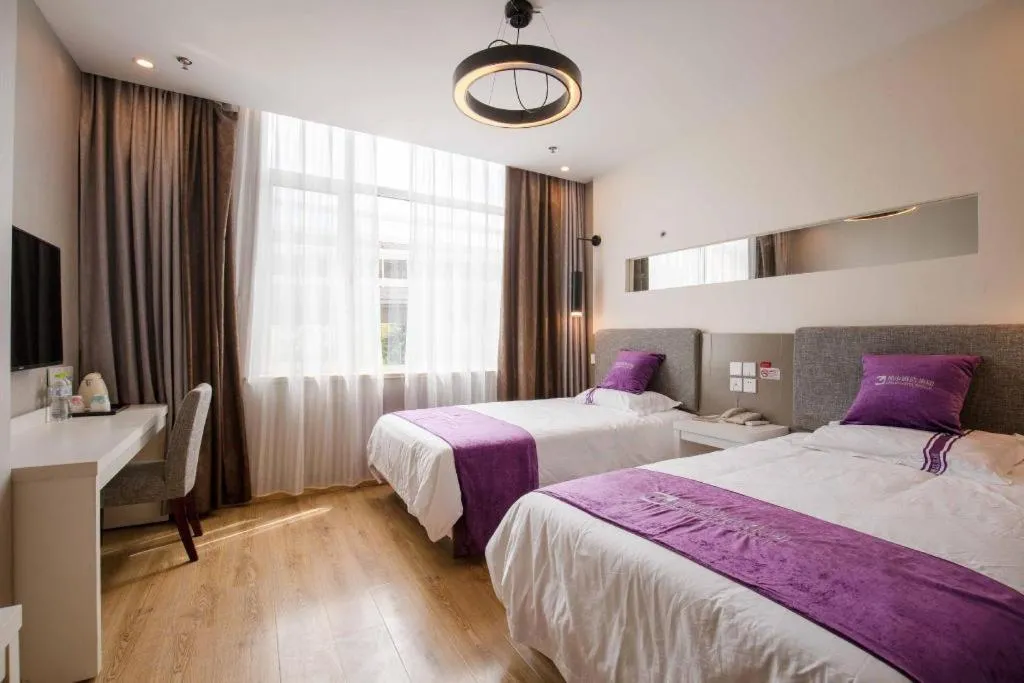 Bed in City 118 Hotel Qingdao Boardcast Tower