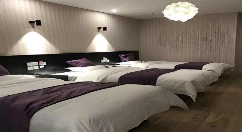 Bed in City 118 Hotel Qingdao Boardcast Tower
