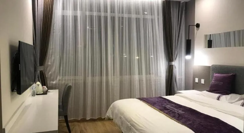Bed in City 118 Hotel Qingdao Boardcast Tower