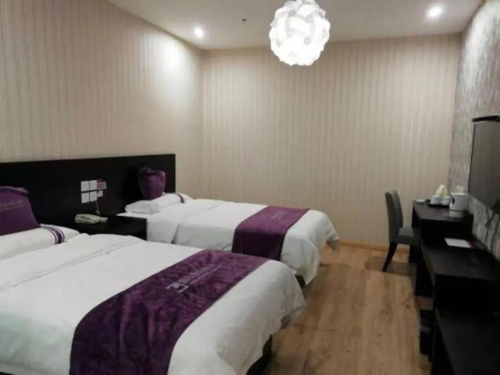Bed in City 118 Hotel Qingdao Boardcast Tower