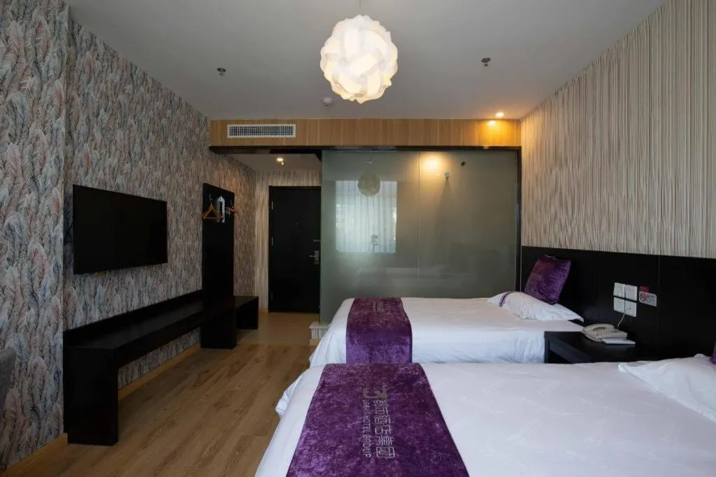 Bed in City 118 Hotel Qingdao Boardcast Tower