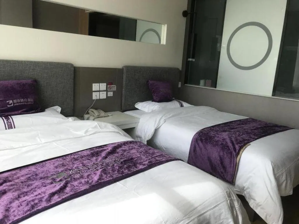 Bed in City 118 Hotel Qingdao Boardcast Tower