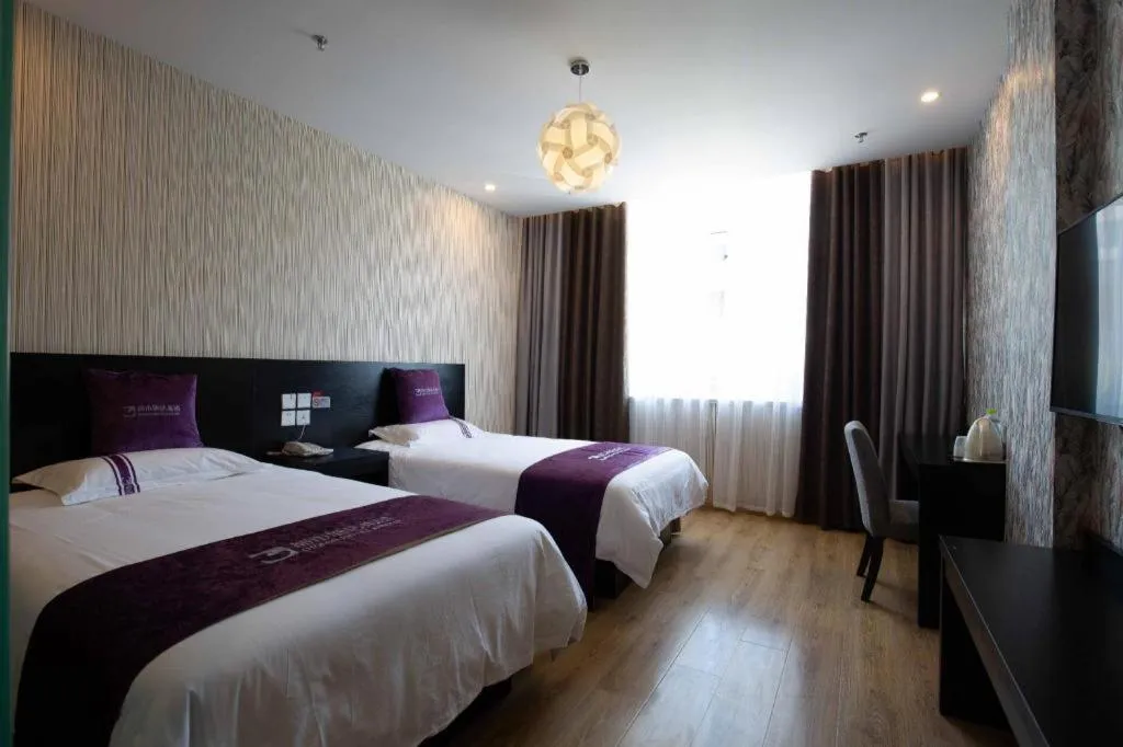 Bed in City 118 Hotel Qingdao Boardcast Tower