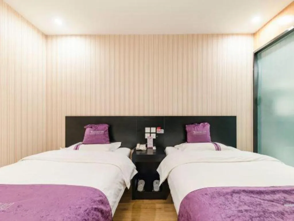 Bed in City 118 Hotel Qingdao Boardcast Tower