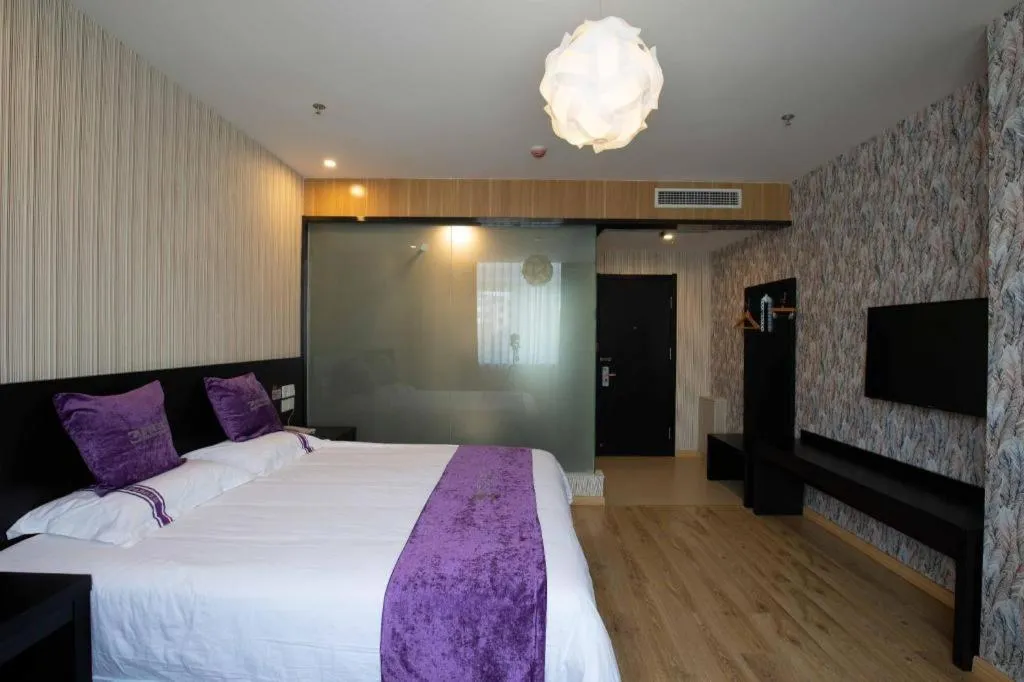 Bed in City 118 Hotel Qingdao Boardcast Tower
