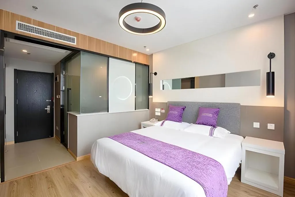 Bed in City 118 Hotel Qingdao Boardcast Tower