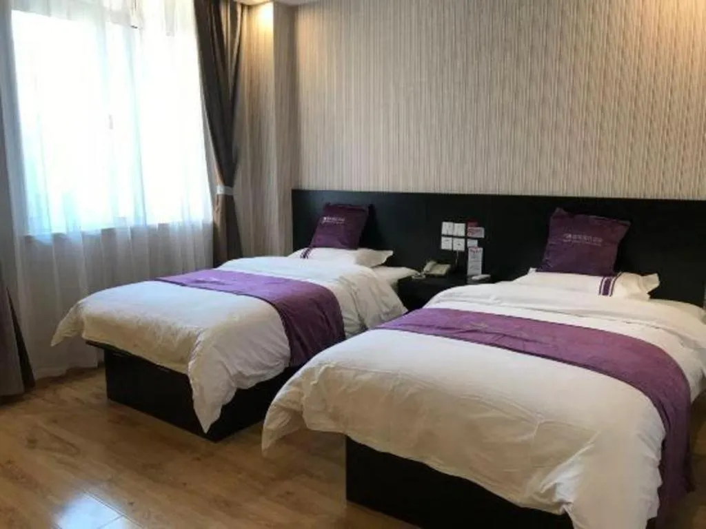 Bed in City 118 Hotel Qingdao Boardcast Tower