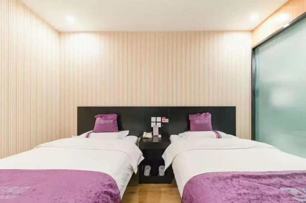 Bed in City 118 Hotel Qingdao Boardcast Tower