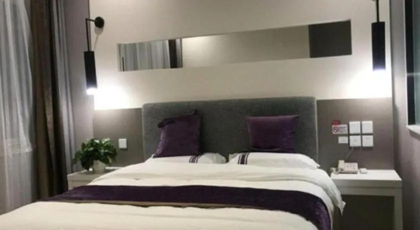 Bed in City 118 Hotel Qingdao Boardcast Tower