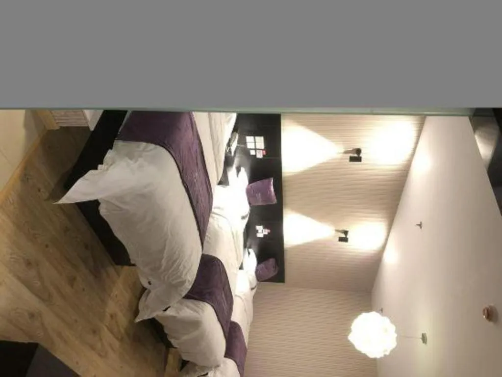 Bed in City 118 Hotel Qingdao Boardcast Tower