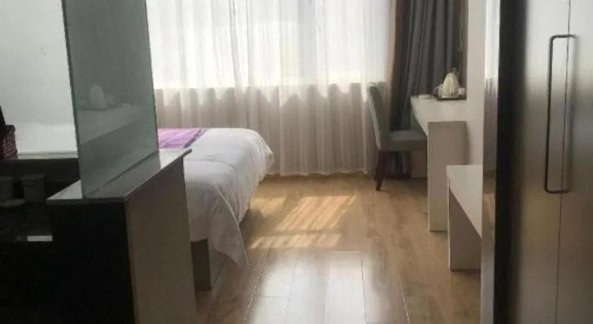 Bed in City 118 Hotel Qingdao Boardcast Tower