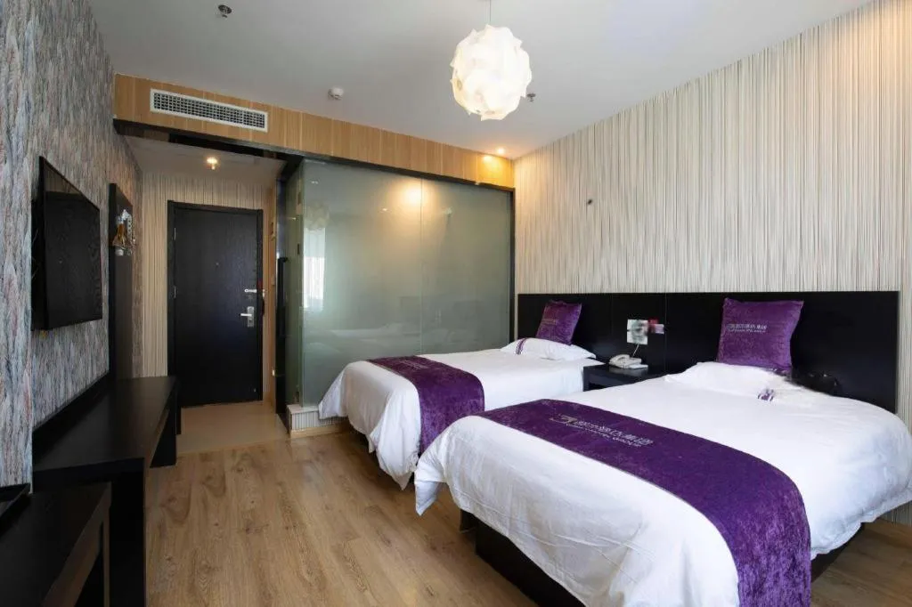 Bed in City 118 Hotel Qingdao Boardcast Tower