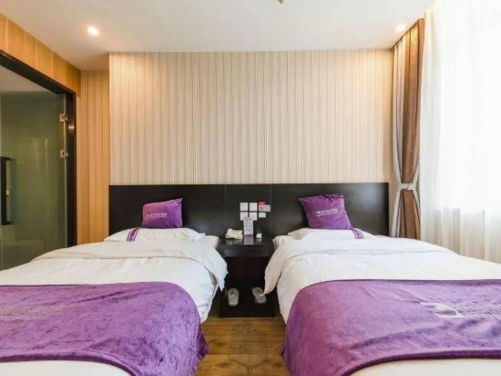 Bed in City 118 Hotel Qingdao Boardcast Tower