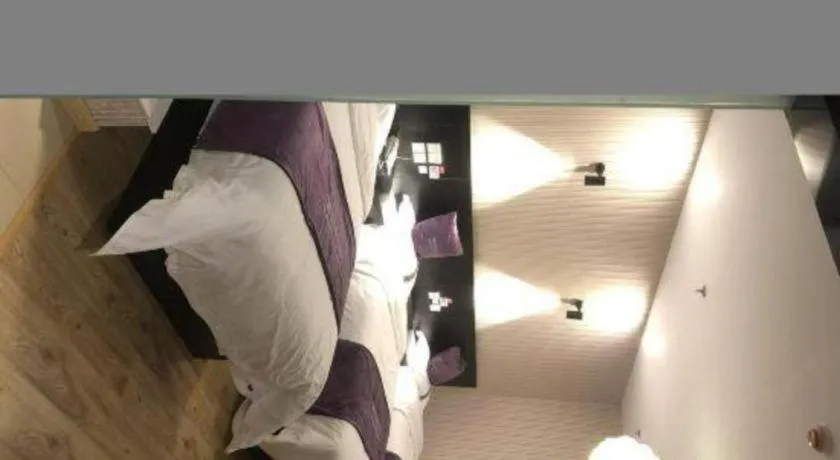 Bed in City 118 Hotel Qingdao Boardcast Tower