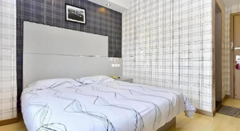 Bed in City 118 Hotel Qingdao Licang Pedestrian Street