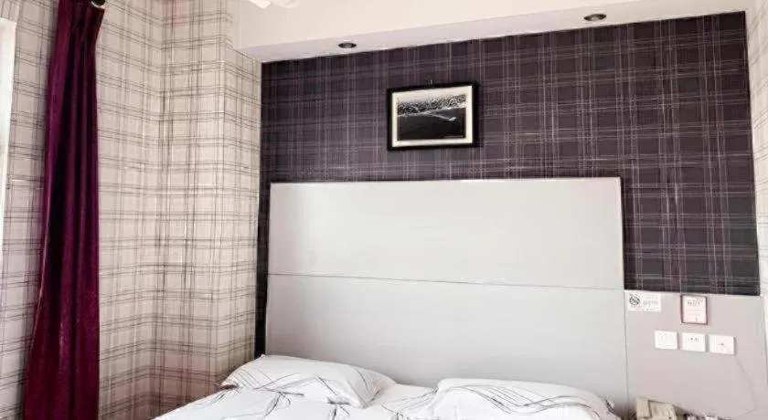 Bed in City 118 Hotel Qingdao Licang Pedestrian Street