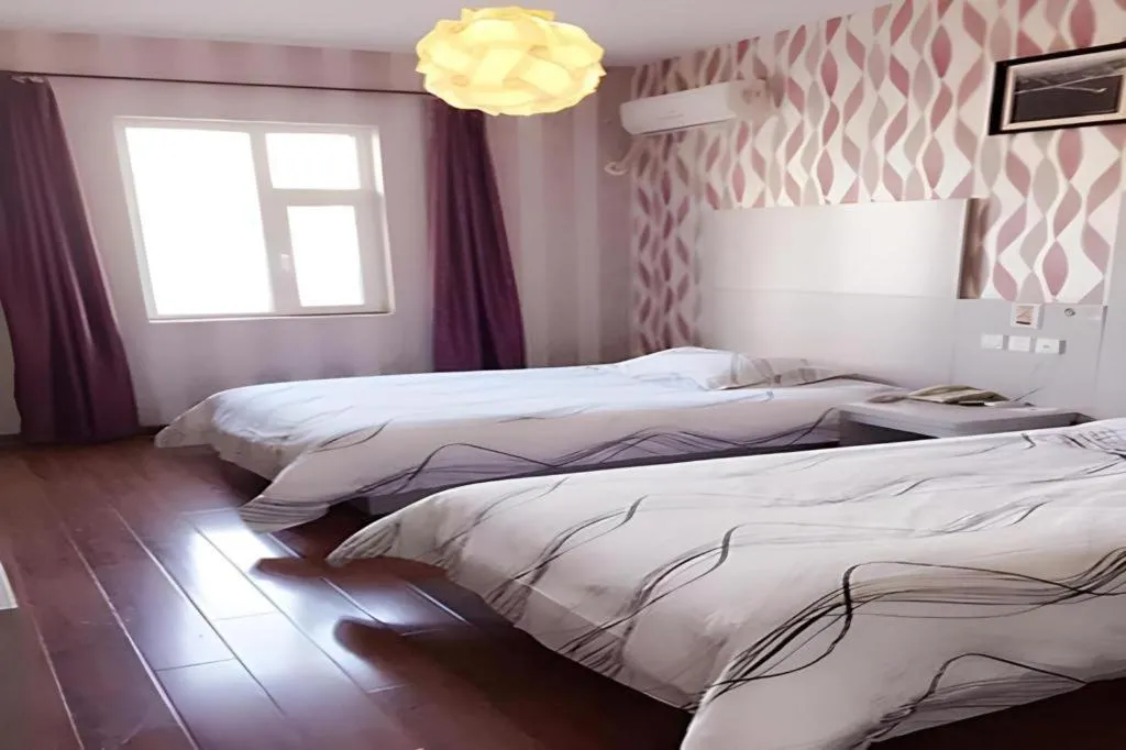 Bed in City 118 Hotel Qingdao Licang Pedestrian Street