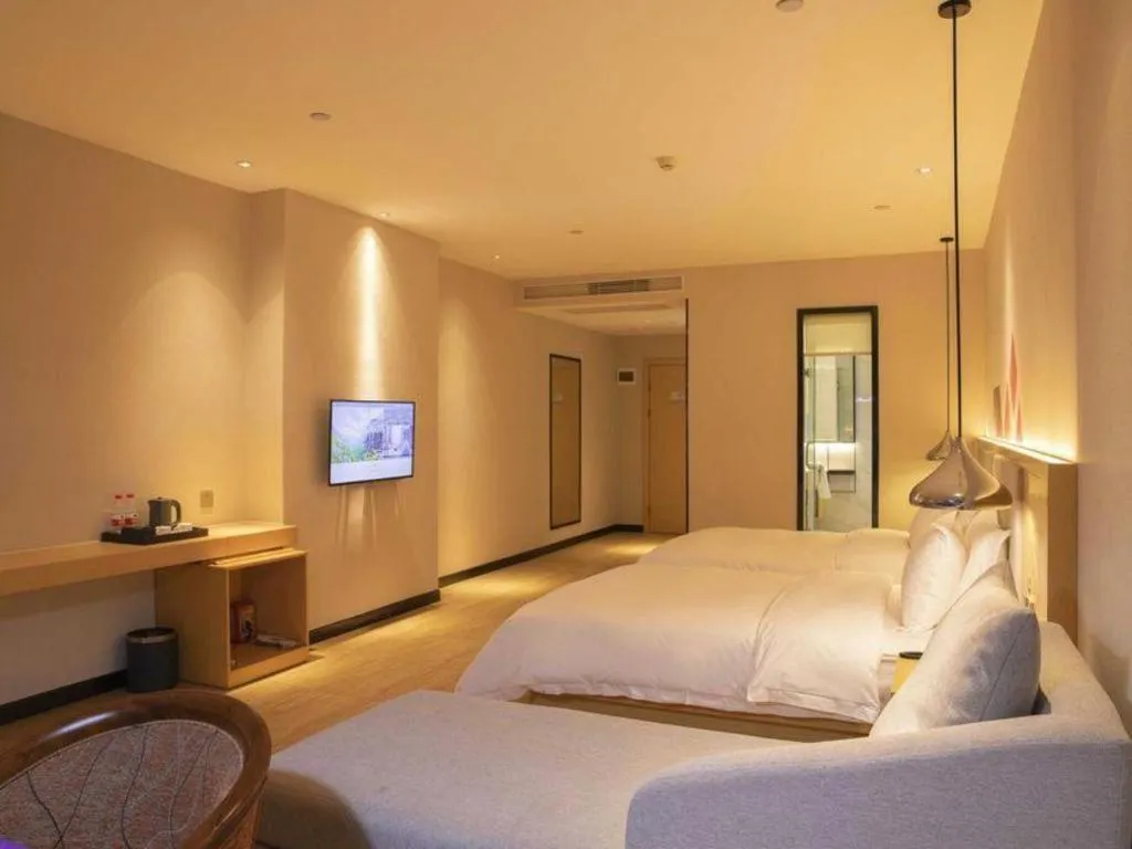 Bed in Borrman Hotel Dongguan Zhongtang