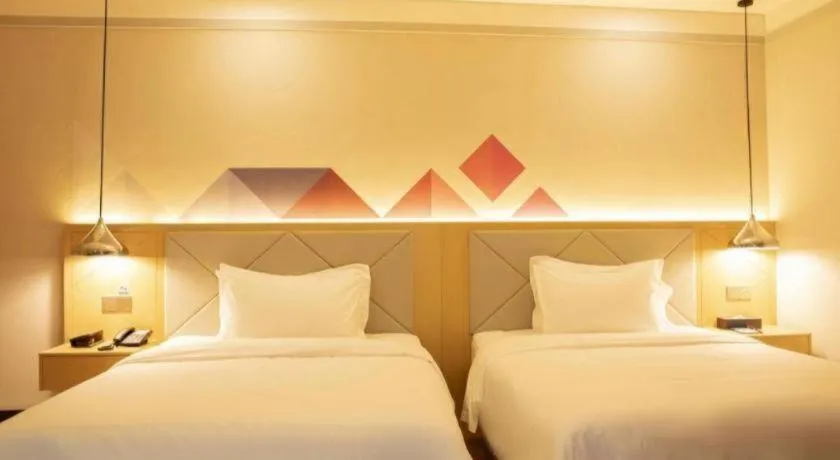 Bed in Borrman Hotel Dongguan Zhongtang