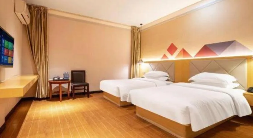 Bed in Borrman Hotel Dongguan Zhongtang