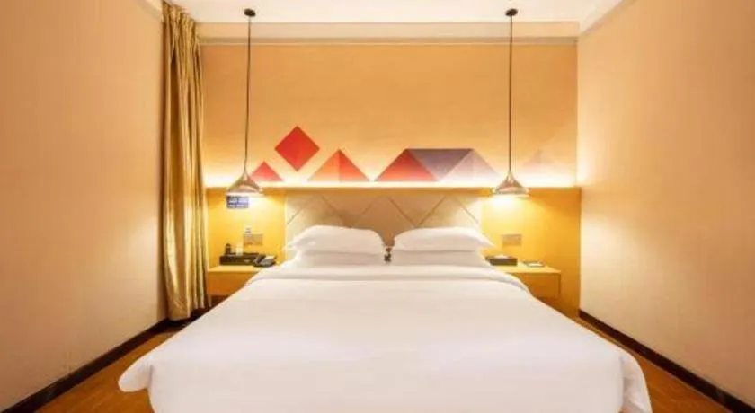 Bed in Borrman Hotel Dongguan Zhongtang