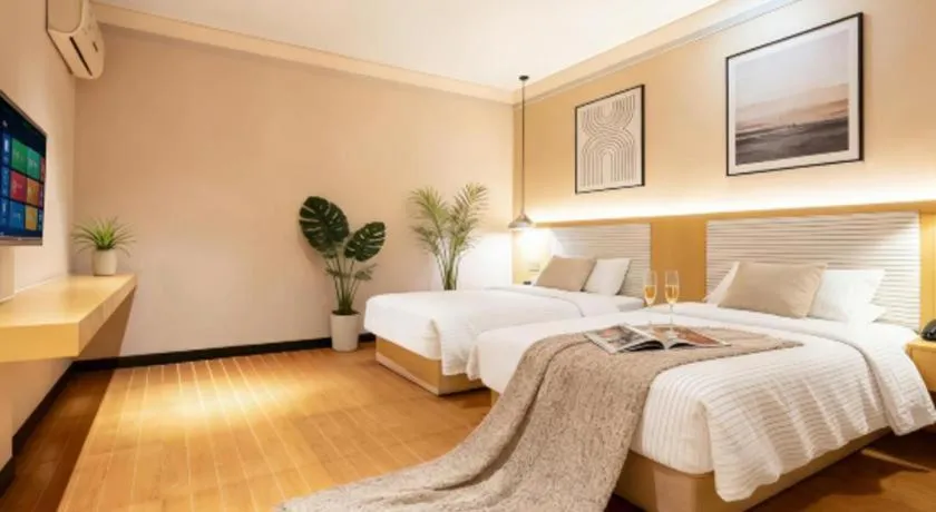 Bed in Borrman Hotel Dongguan Zhongtang