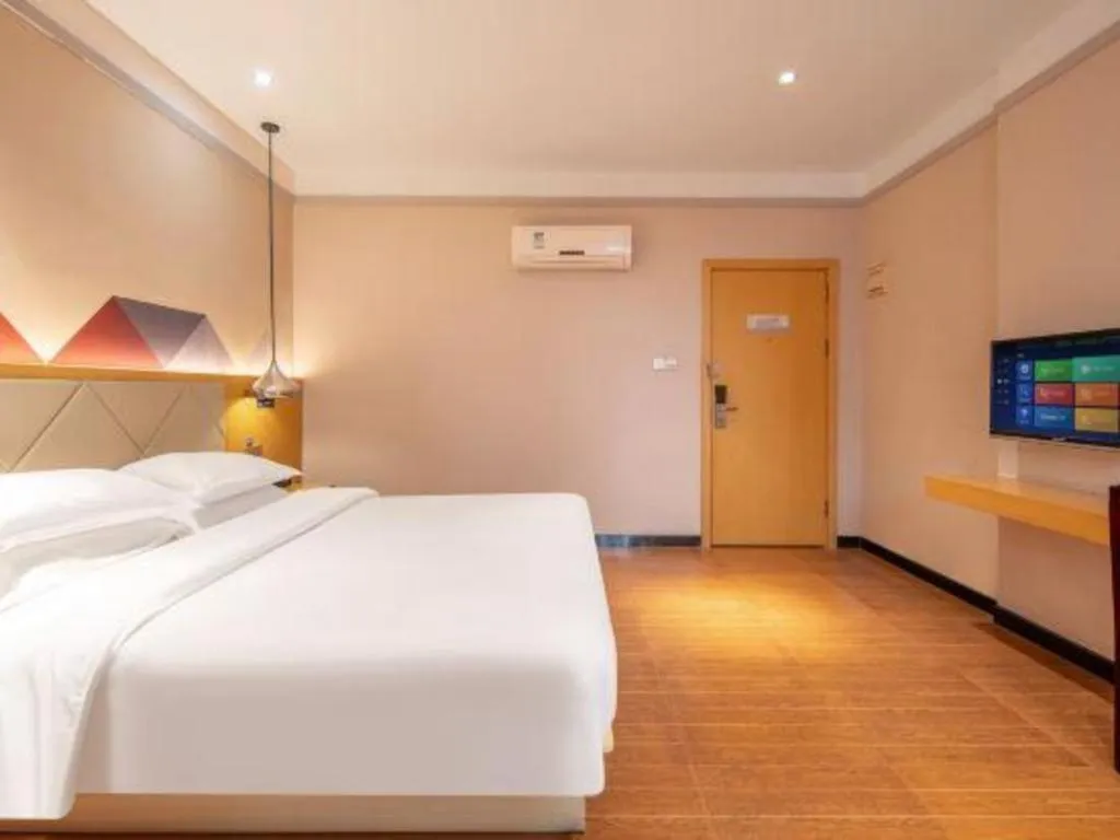 Bed in Borrman Hotel Dongguan Zhongtang