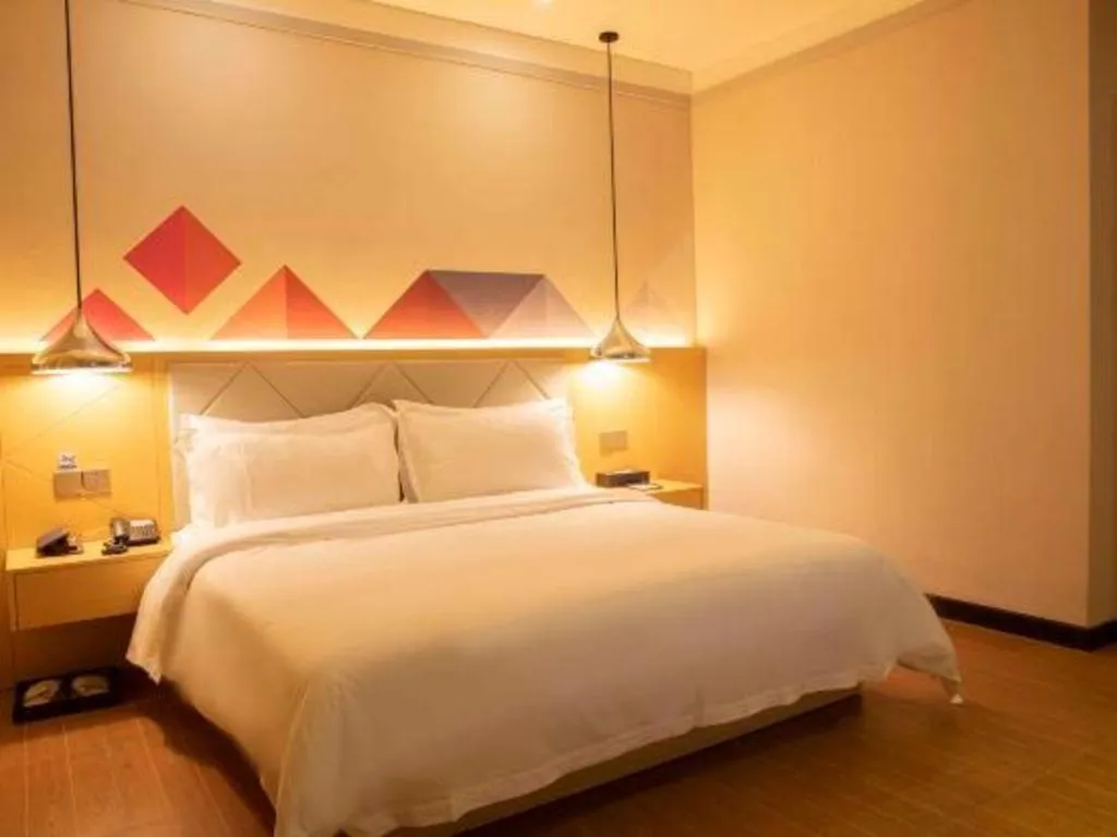 Bed in Borrman Hotel Dongguan Zhongtang