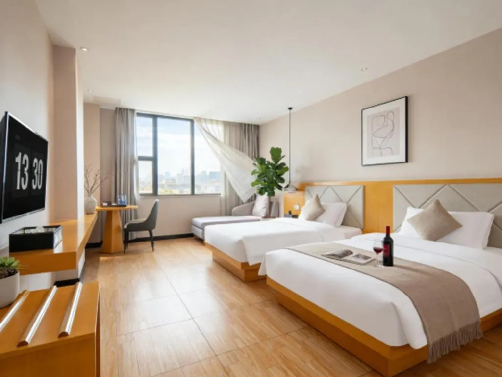 Bed in Borrman Hotel Dongguan Zhongtang