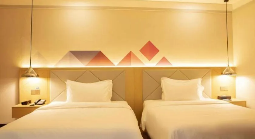 Bed in Borrman Hotel Dongguan Zhongtang