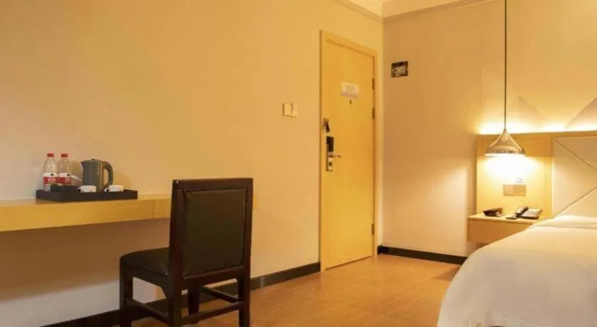 Bed in Borrman Hotel Dongguan Zhongtang