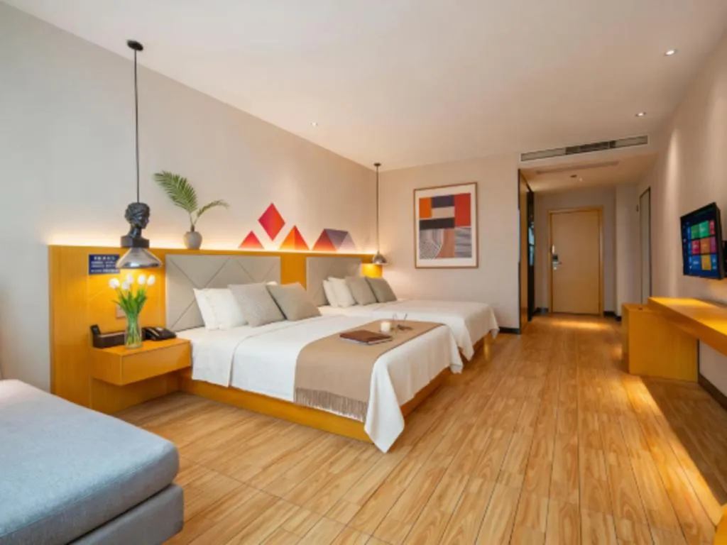 Bed in Borrman Hotel Dongguan Zhongtang