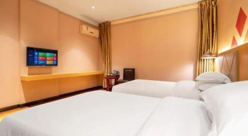 Bed in Borrman Hotel Dongguan Zhongtang
