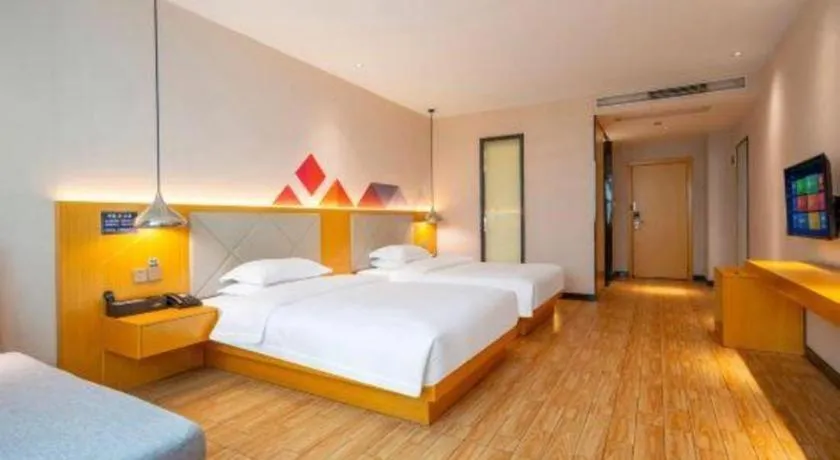 Bed in Borrman Hotel Dongguan Zhongtang