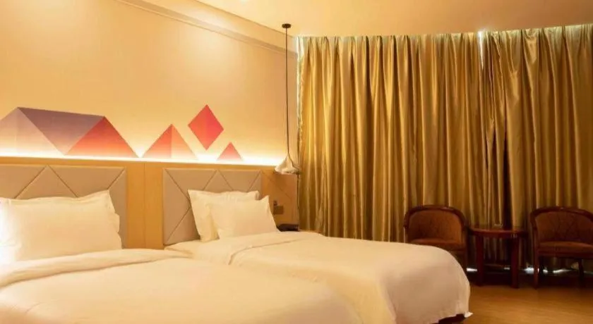Bed in Borrman Hotel Dongguan Zhongtang