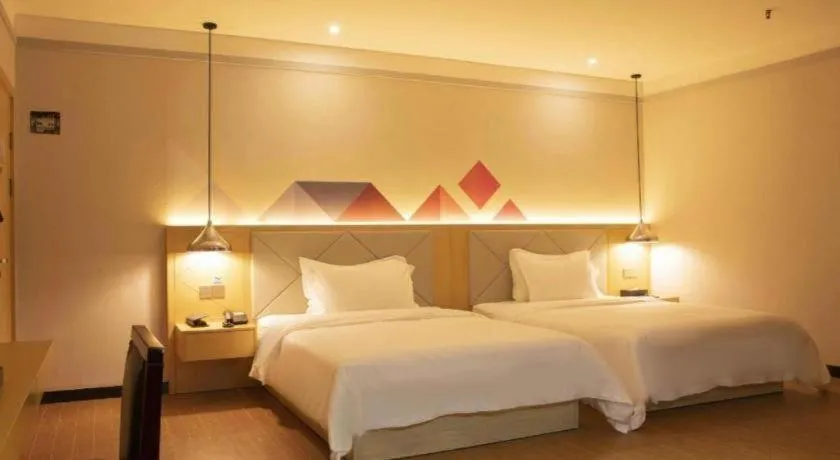Bed in Borrman Hotel Dongguan Zhongtang