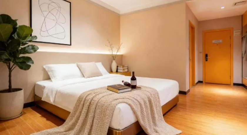 Bed in Borrman Hotel Dongguan Zhongtang