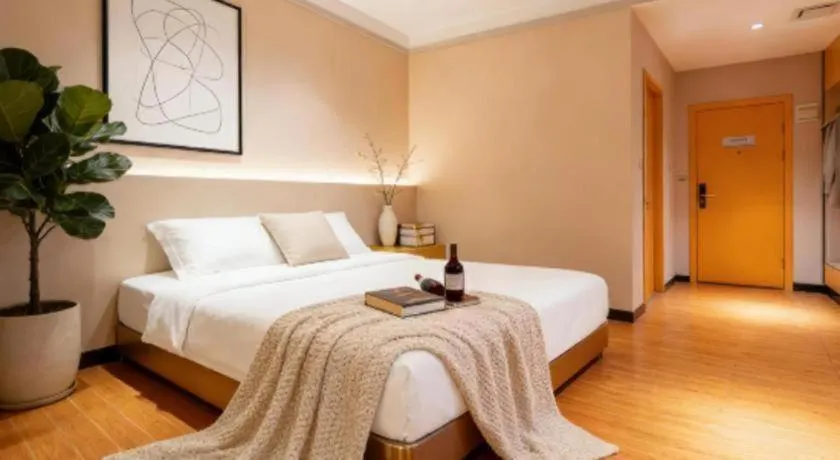 Bed in Borrman Hotel Dongguan Zhongtang