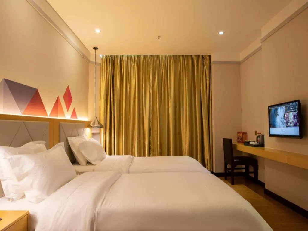 Bed in Borrman Hotel Dongguan Zhongtang