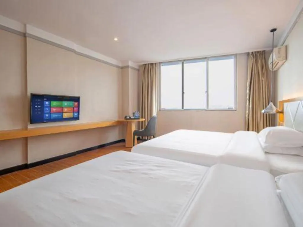 Bed in Borrman Hotel Dongguan Zhongtang
