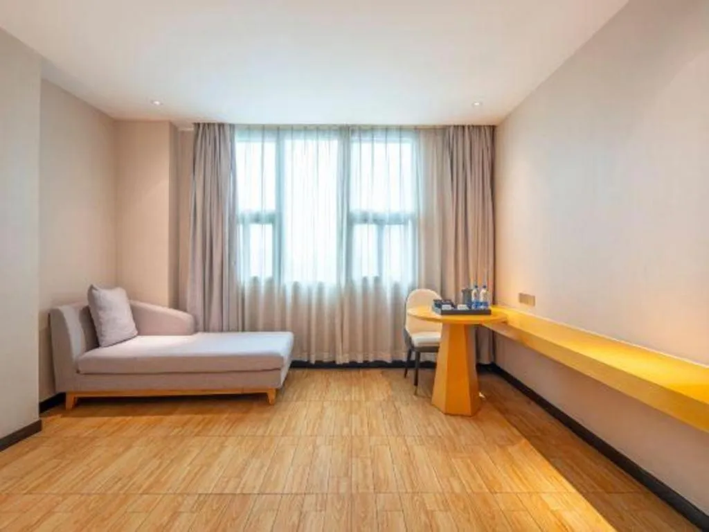 Bed in Borrman Hotel Dongguan Zhongtang