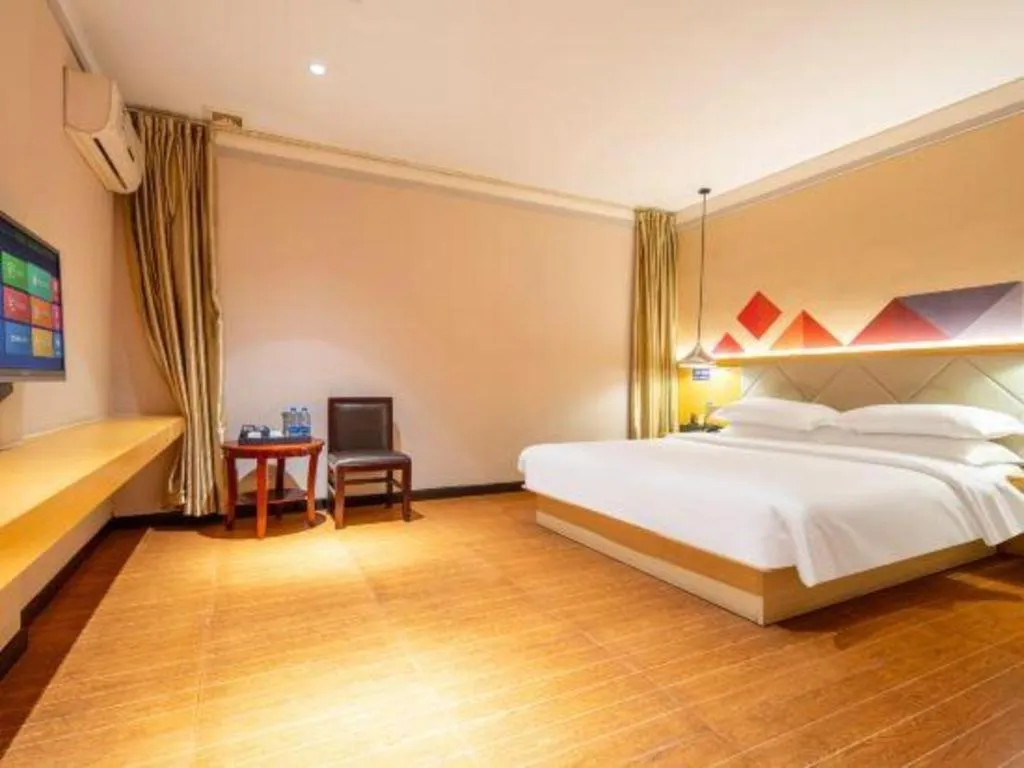 Bed in Borrman Hotel Dongguan Zhongtang