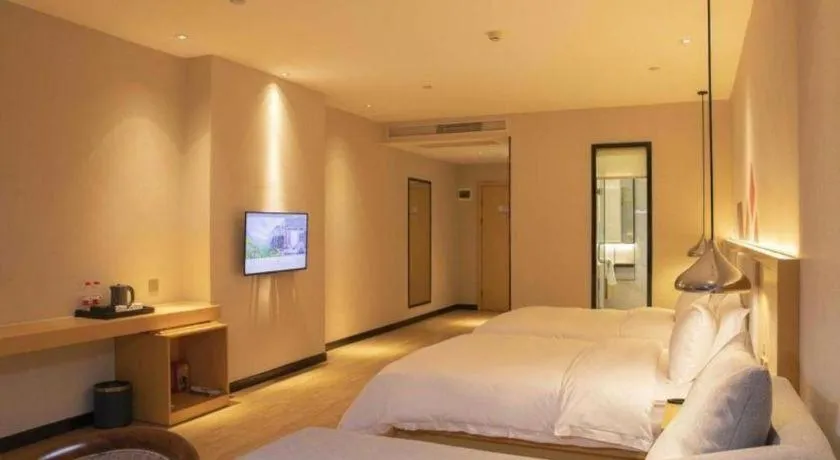 Bed in Borrman Hotel Dongguan Zhongtang