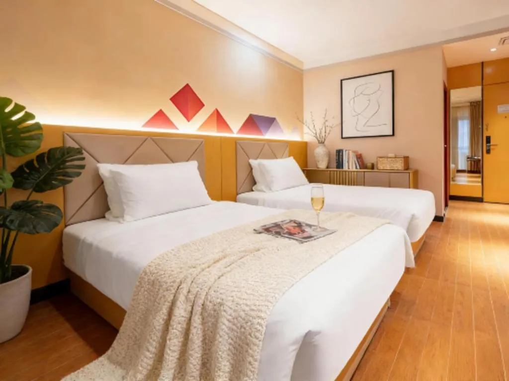 Bed in Borrman Hotel Dongguan Zhongtang