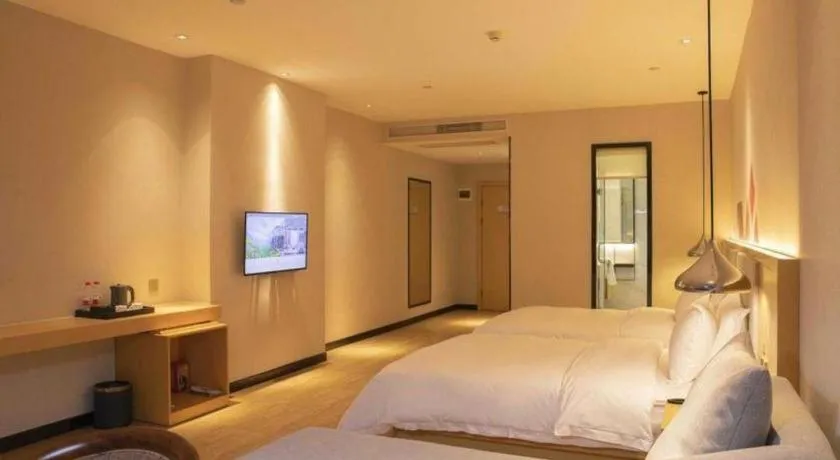 Bed in Borrman Hotel Dongguan Zhongtang