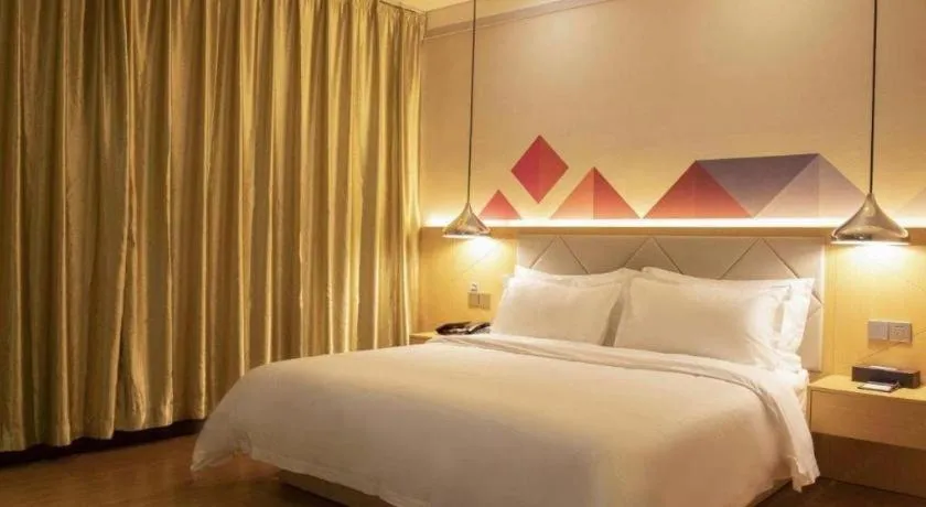 Bed in Borrman Hotel Dongguan Zhongtang